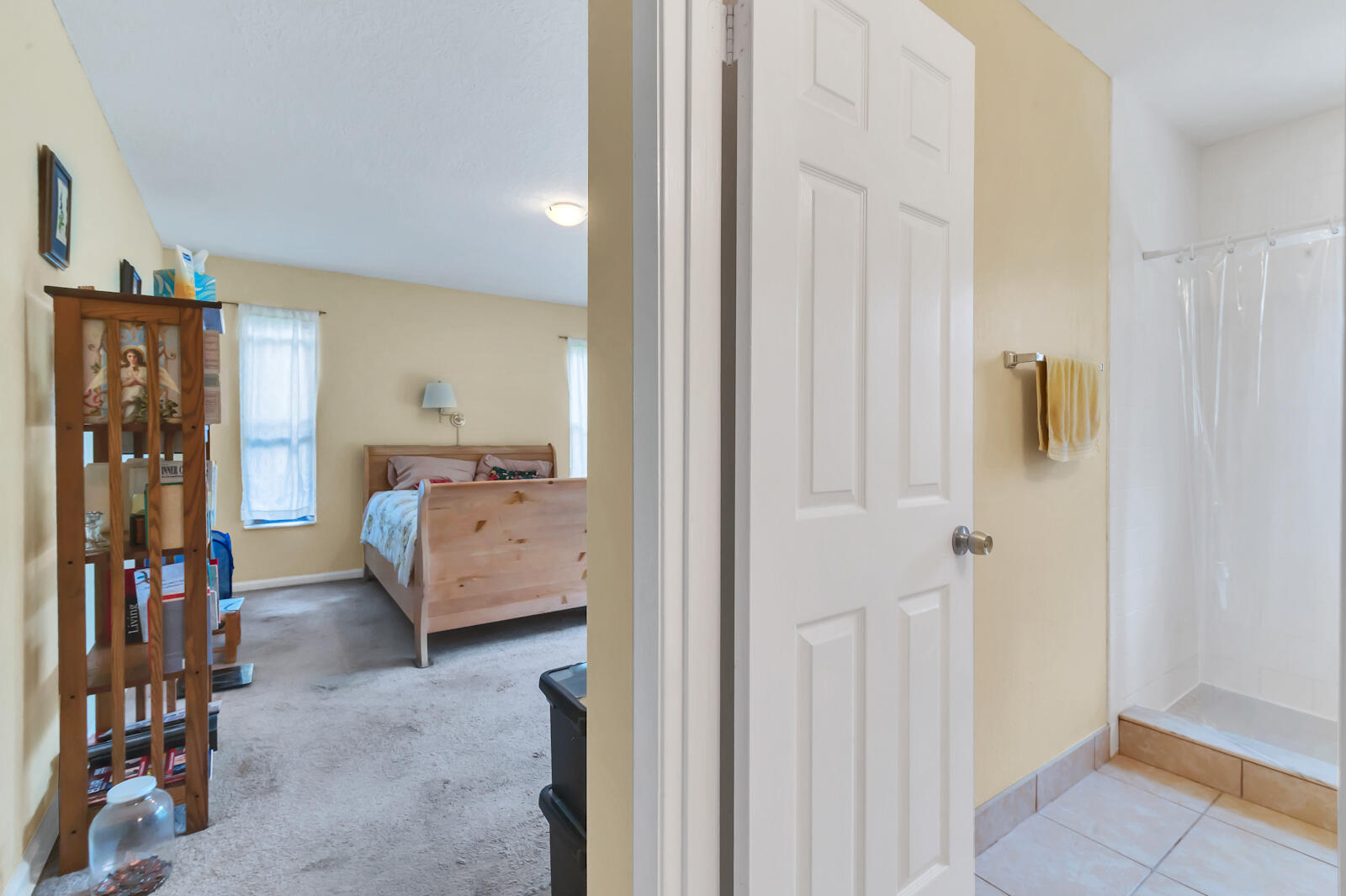 4091 Mandarin Boulevard Loxahatchee, FL 33470 - Photo 21 of 31 a view of a bedroom with walk in closet and bedroom