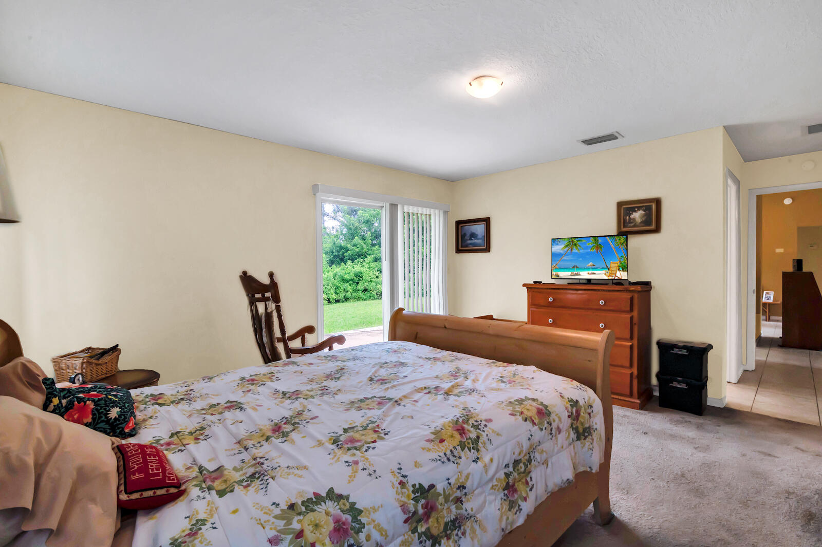 4091 Mandarin Boulevard Loxahatchee, FL 33470 - Photo 23 of 31 a bedroom with a bed and wooden floor
