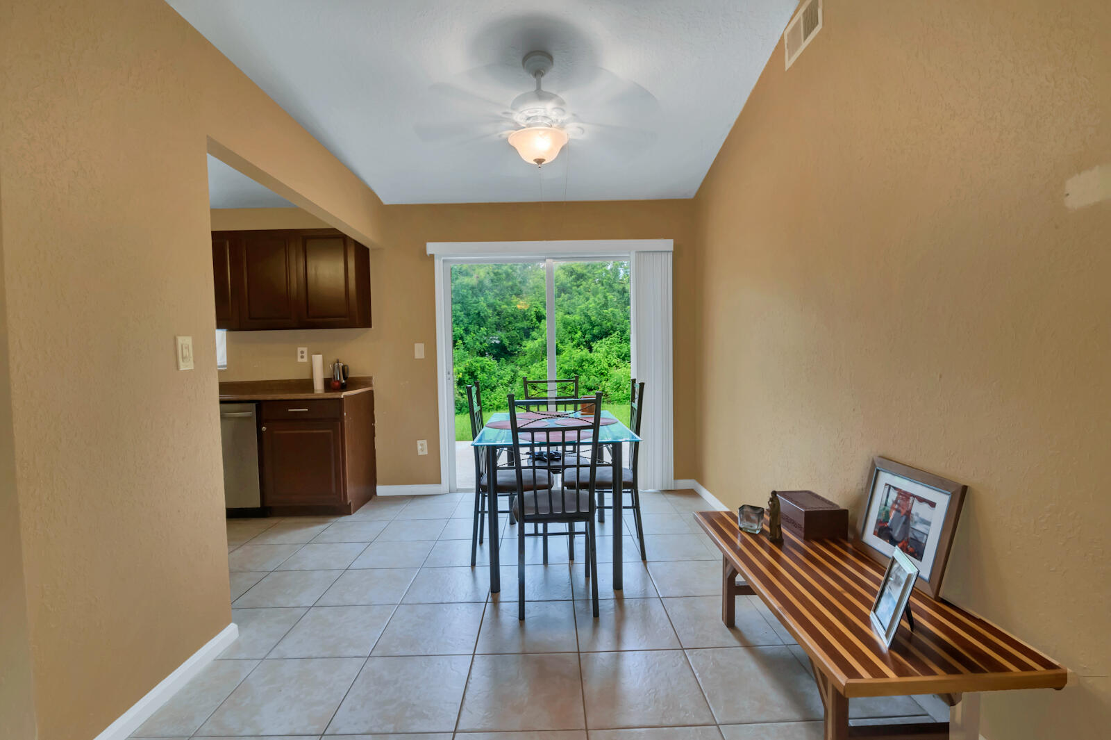 4091 Mandarin Boulevard Loxahatchee, FL 33470 - Photo 9 of 31 a living room with furniture and a floor to ceiling window