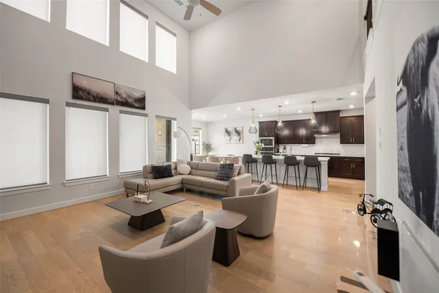a living room with fireplace furniture and a flat screen tv