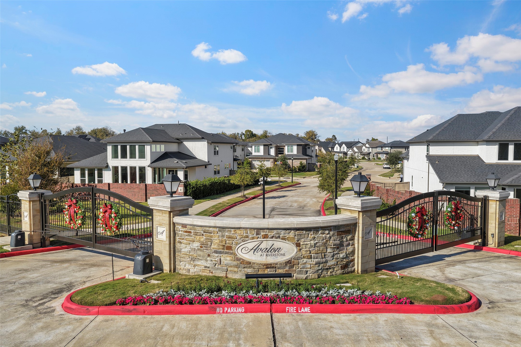 4802 Pecos Ridge Lane Sugar Land, TX 77479 - Photo 2 of 48 a view of a white house with a big yard and potted plants