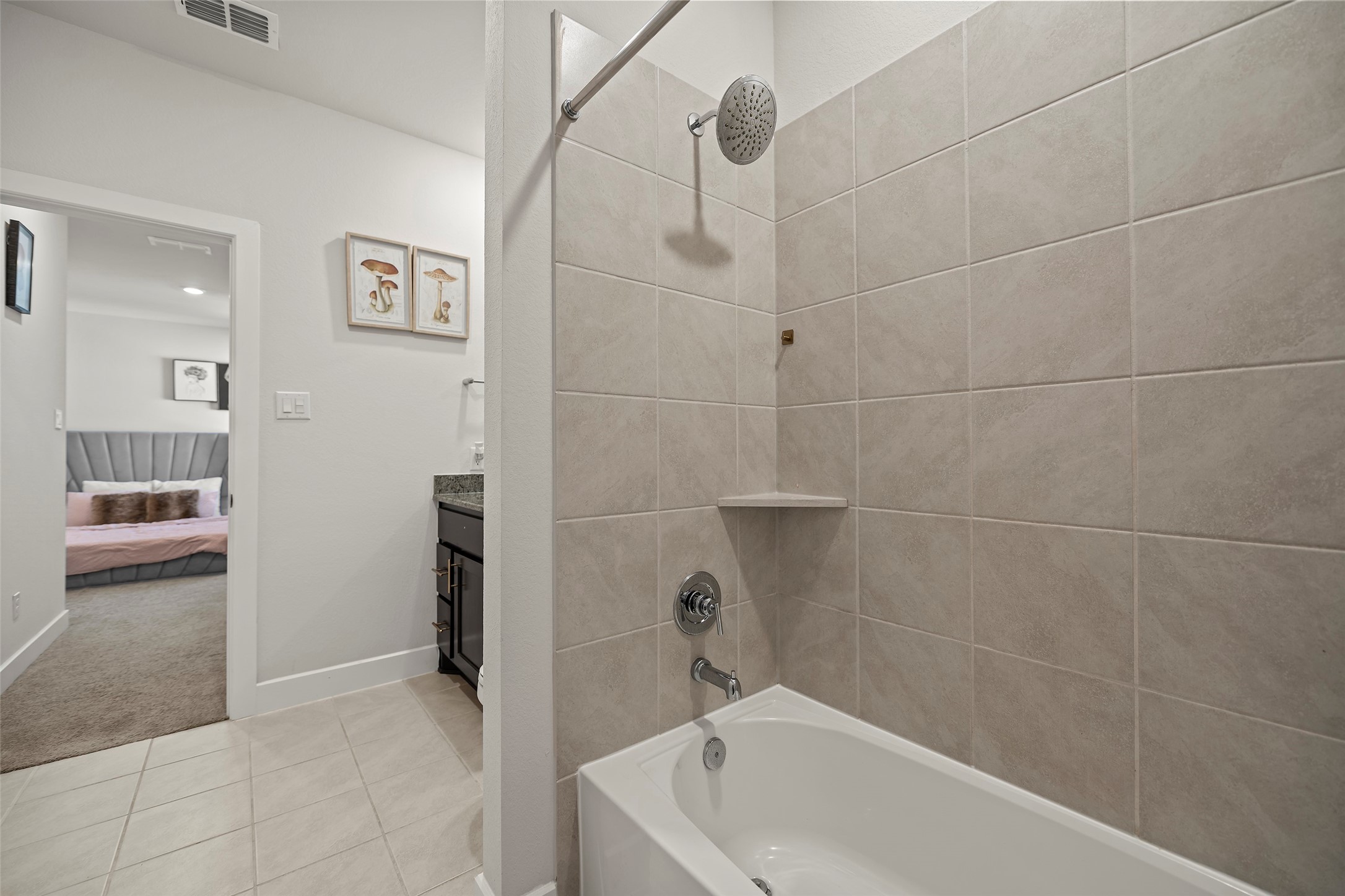 4802 Pecos Ridge Lane Sugar Land, TX 77479 - Photo 29 of 48 a bathroom with a bathtub