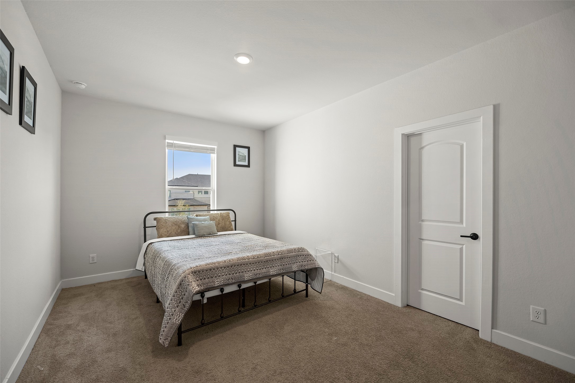 4802 Pecos Ridge Lane Sugar Land, TX 77479 - Photo 30 of 48 a bedroom with a bed and a window