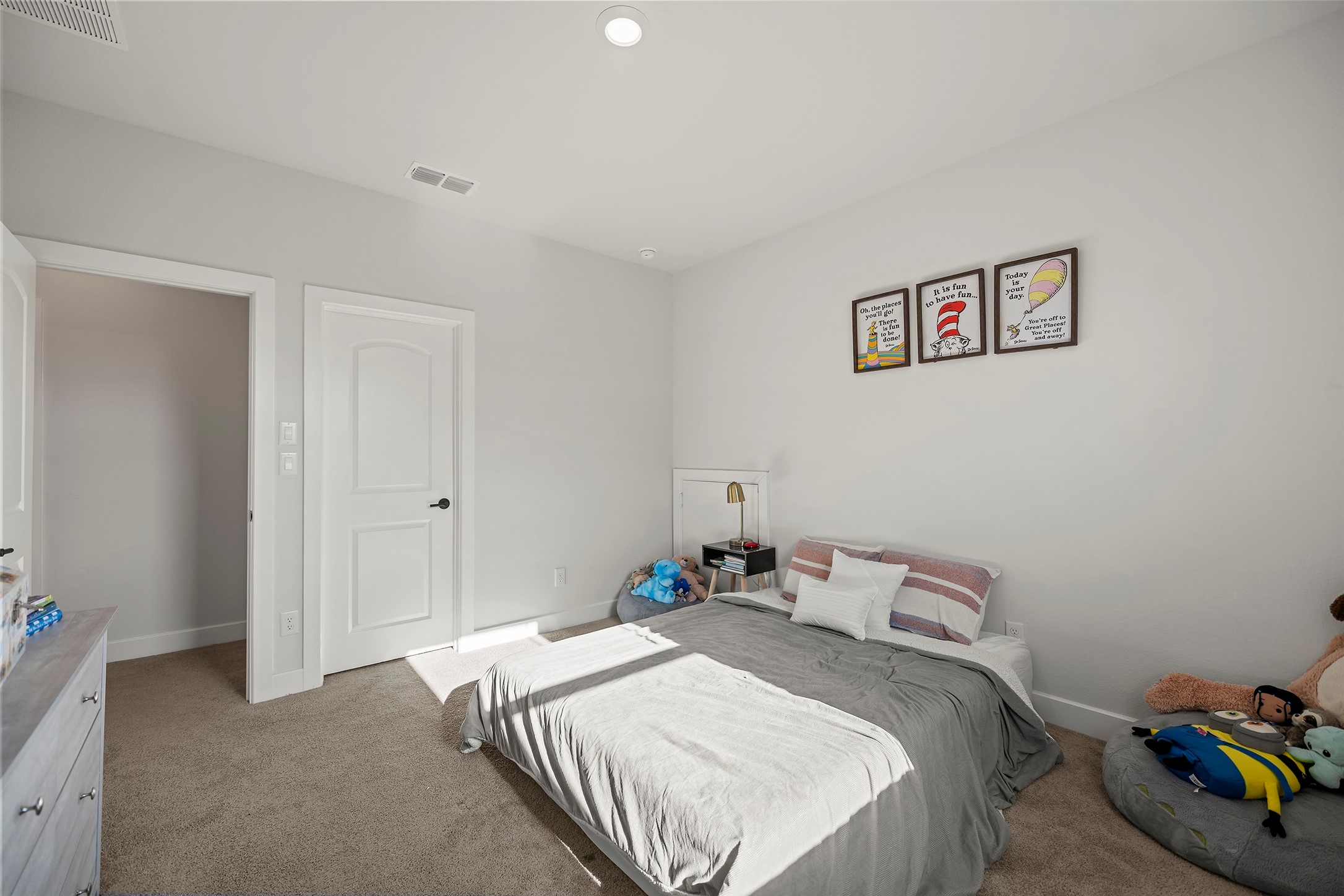 4802 Pecos Ridge Lane Sugar Land, TX 77479 - Photo 35 of 48 a bedroom with a bed and a wall painting