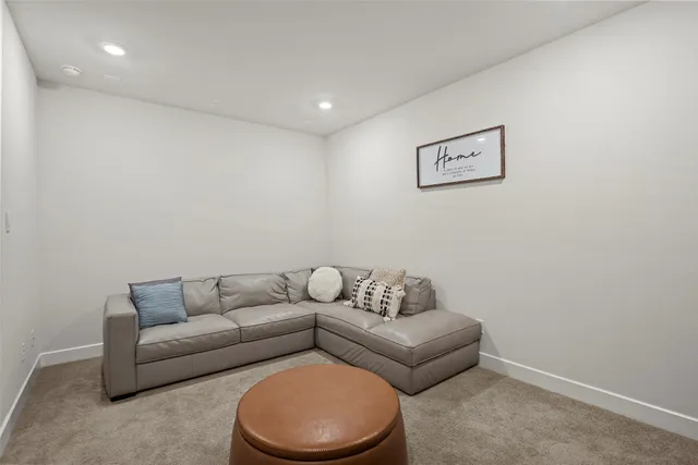 a living room with furniture and a couch