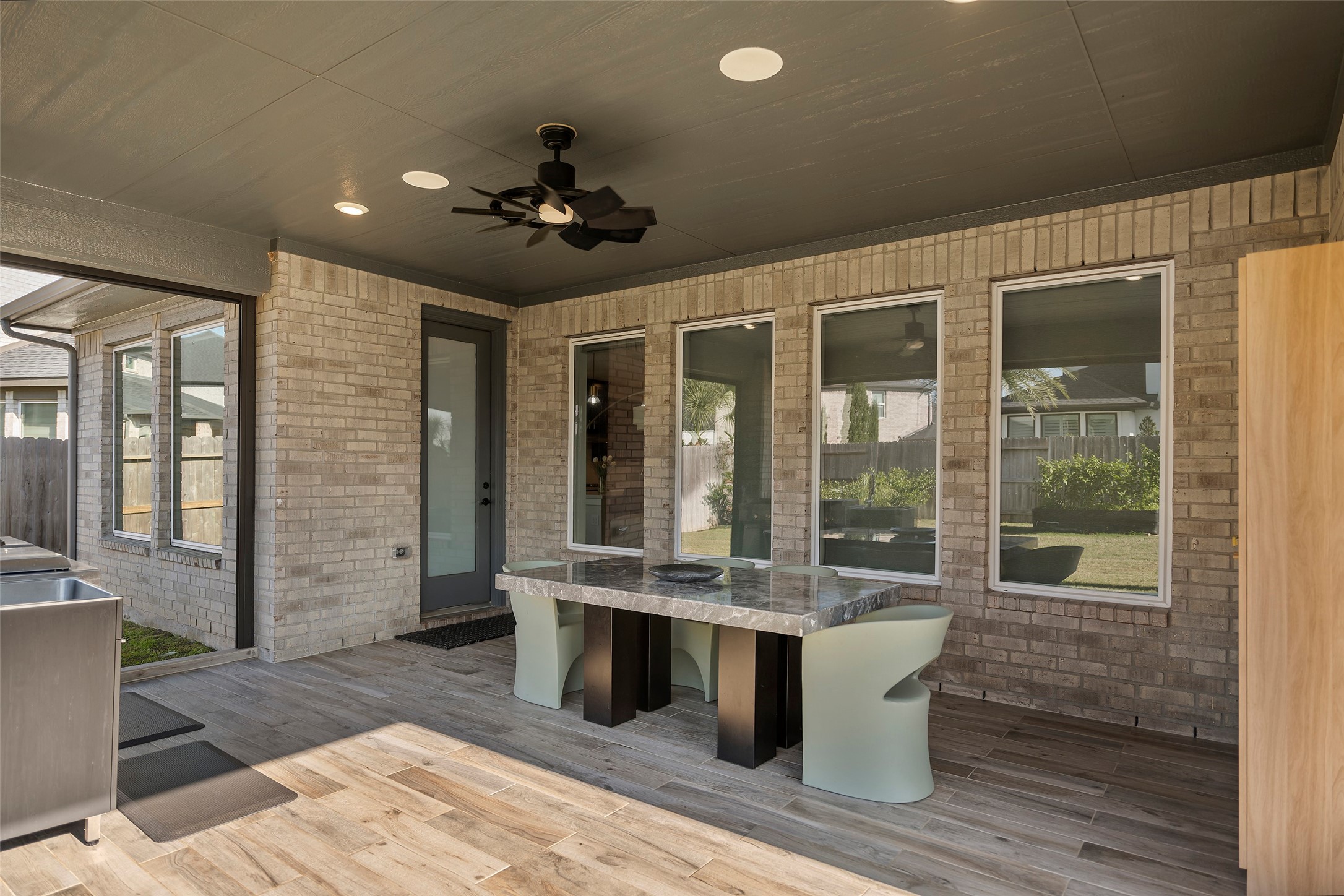 4802 Pecos Ridge Lane Sugar Land, TX 77479 - Photo 41 of 48 a view of a living room and kitchen with a large window