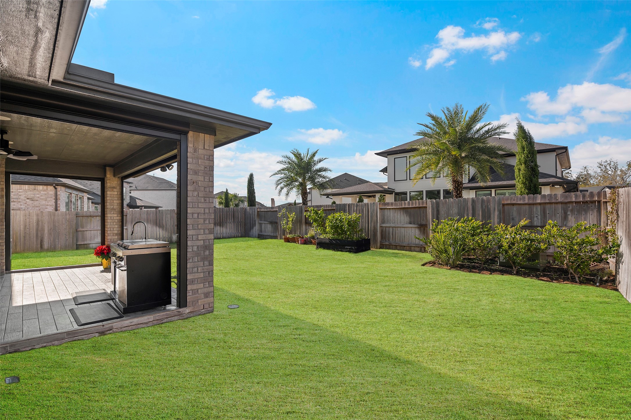4802 Pecos Ridge Lane Sugar Land, TX 77479 - Photo 43 of 48 a view of an house with backyard space and garden