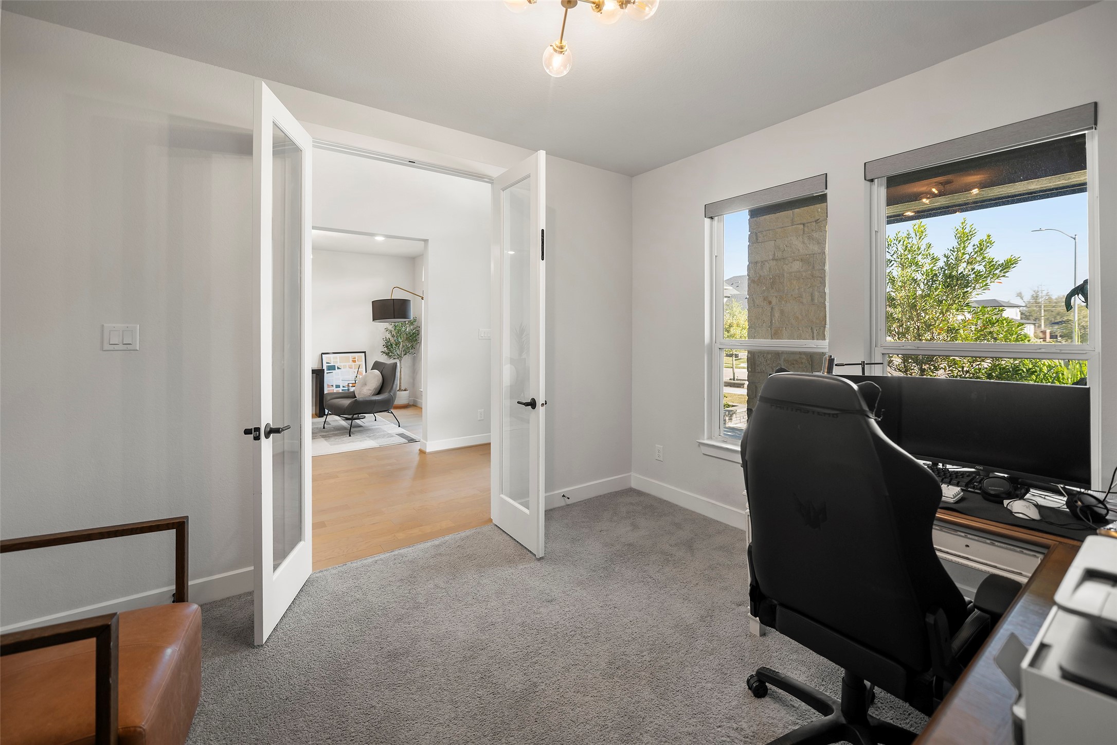 4802 Pecos Ridge Lane Sugar Land, TX 77479 - Photo 9 of 48 a view of a workspace with furniture and a window