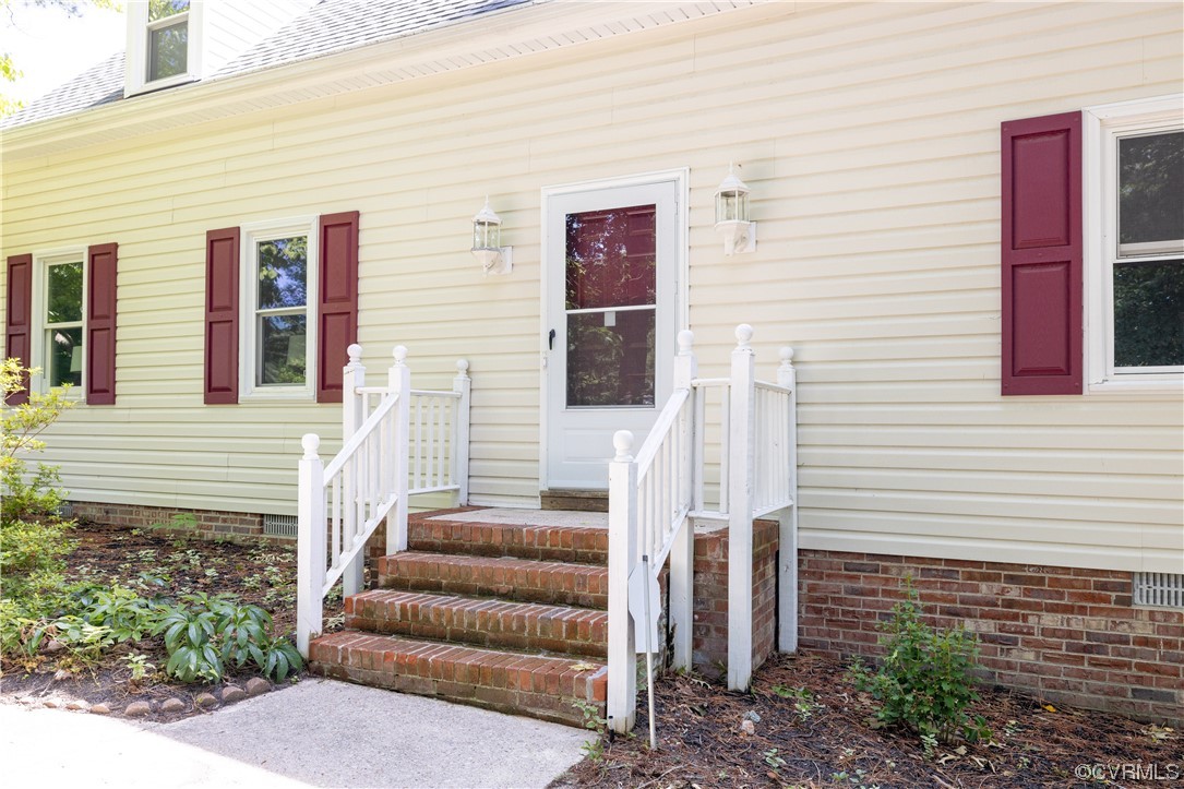 4531 Crossgate Road Chester, VA 23831 - Photo 2 of 37 a front view of a house with stairs