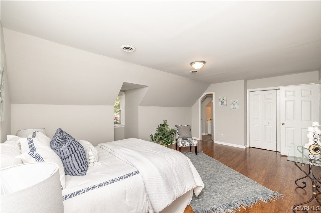 4531 Crossgate Road Chester, VA 23831 - Photo 22 of 37 a bedroom with a bed and a table