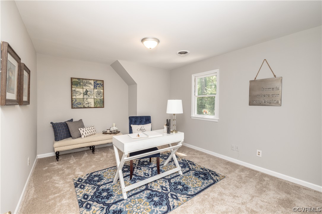 4531 Crossgate Road Chester, VA 23831 - Photo 30 of 37 a living room with furniture and a window