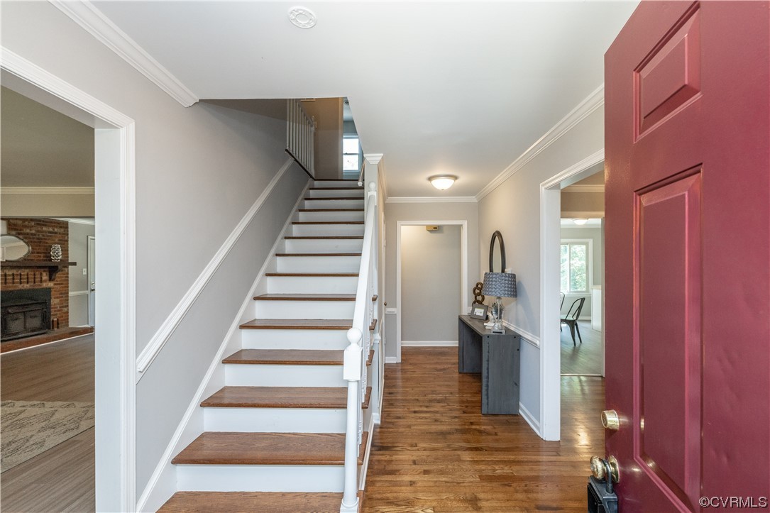 4531 Crossgate Road Chester, VA 23831 - Photo 3 of 37 a view of an entryway with wooden floor and staircase
