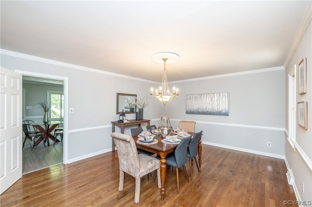 4531 Crossgate Road Chester, VA 23831 - Photo 8 of 37 a view of a dining room with furniture window and wooden floor