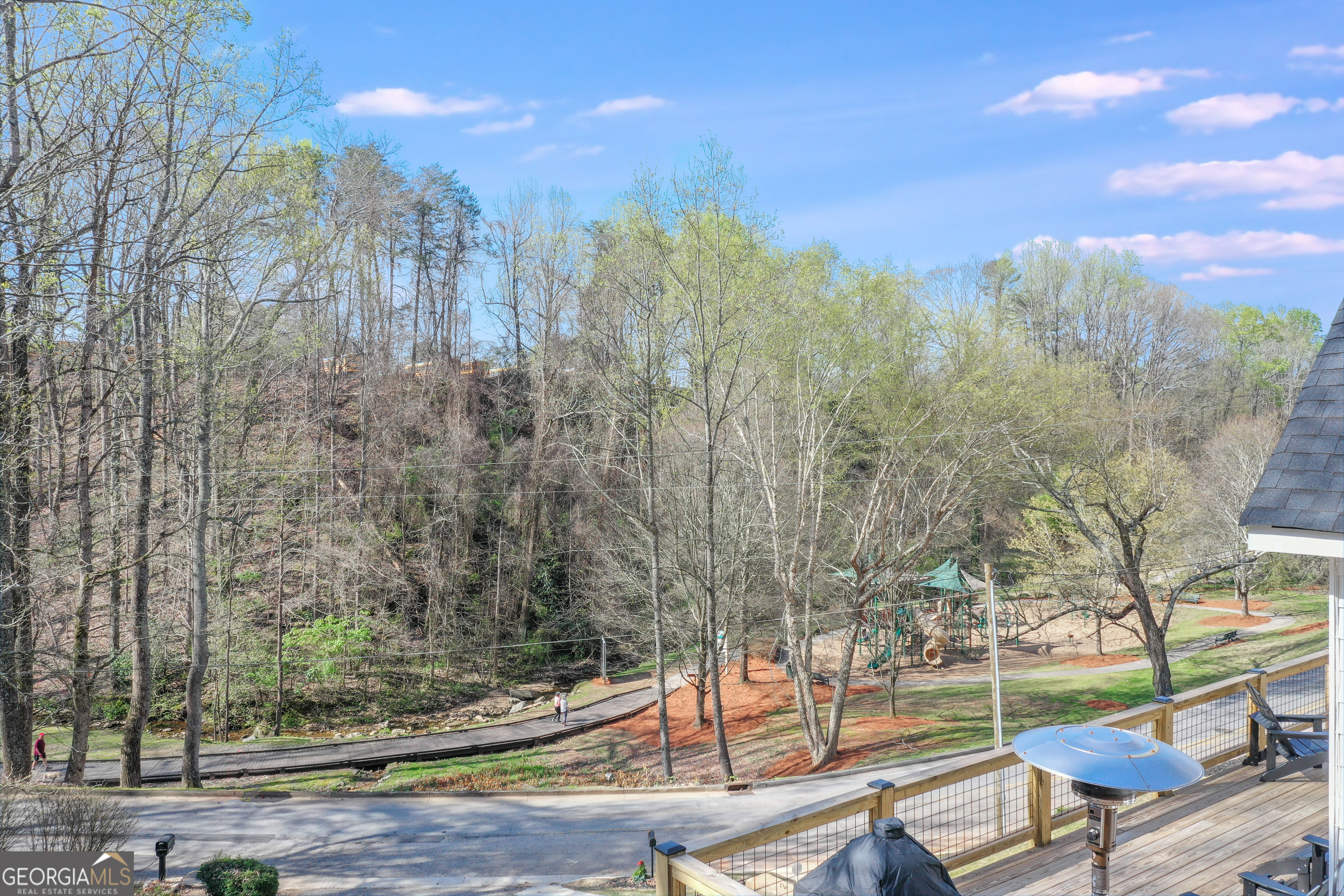 804 Wilshire Road Gainesville, GA 30501 - Photo 12 of 41 a view of a yard with plants and a bench
