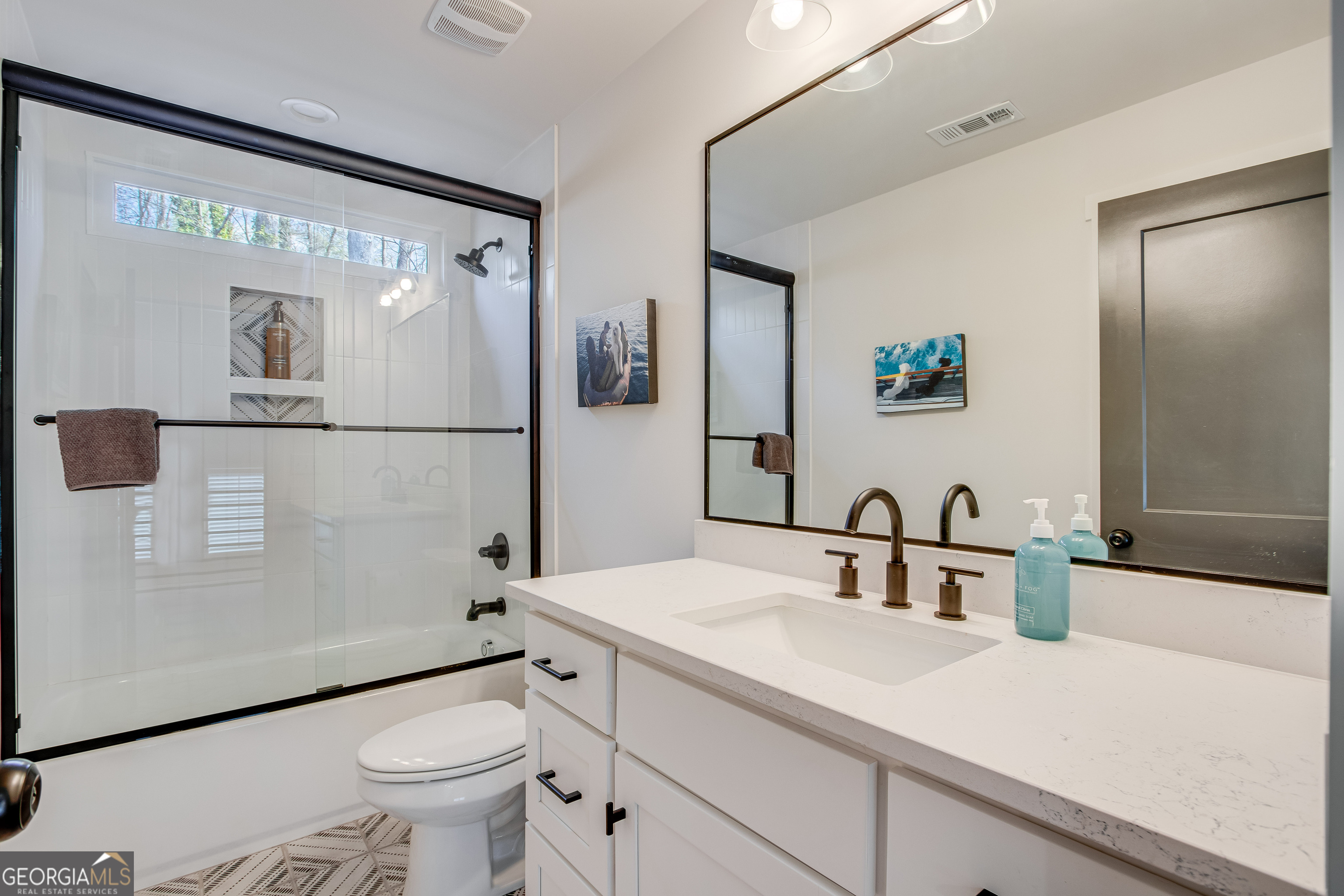 804 Wilshire Road Gainesville, GA 30501 - Photo 25 of 41 a bathroom with a sink toilet and shower