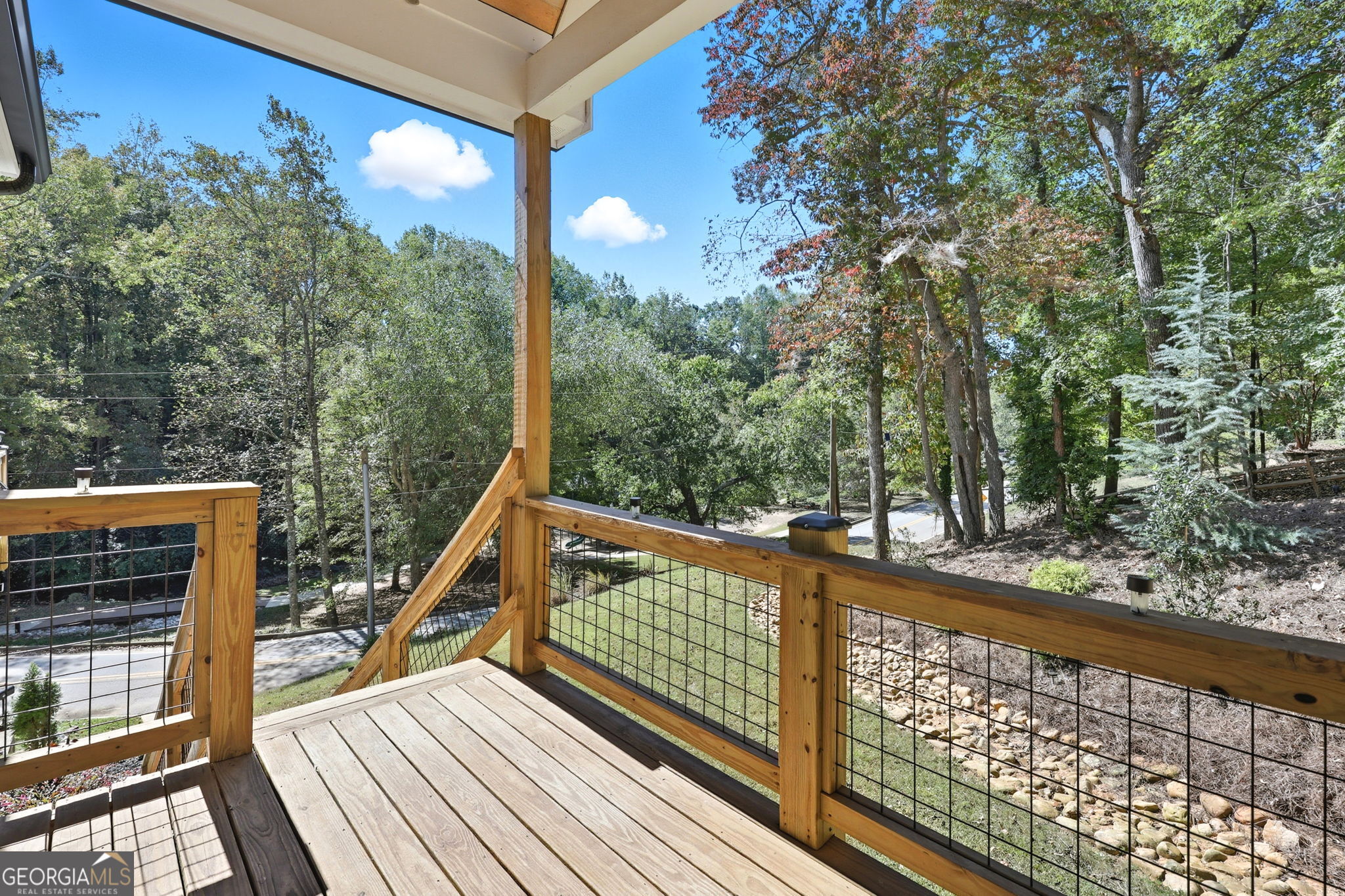 804 Wilshire Road Gainesville, GA 30501 - Photo 3 of 41 a view of balcony with wooden floor and fence