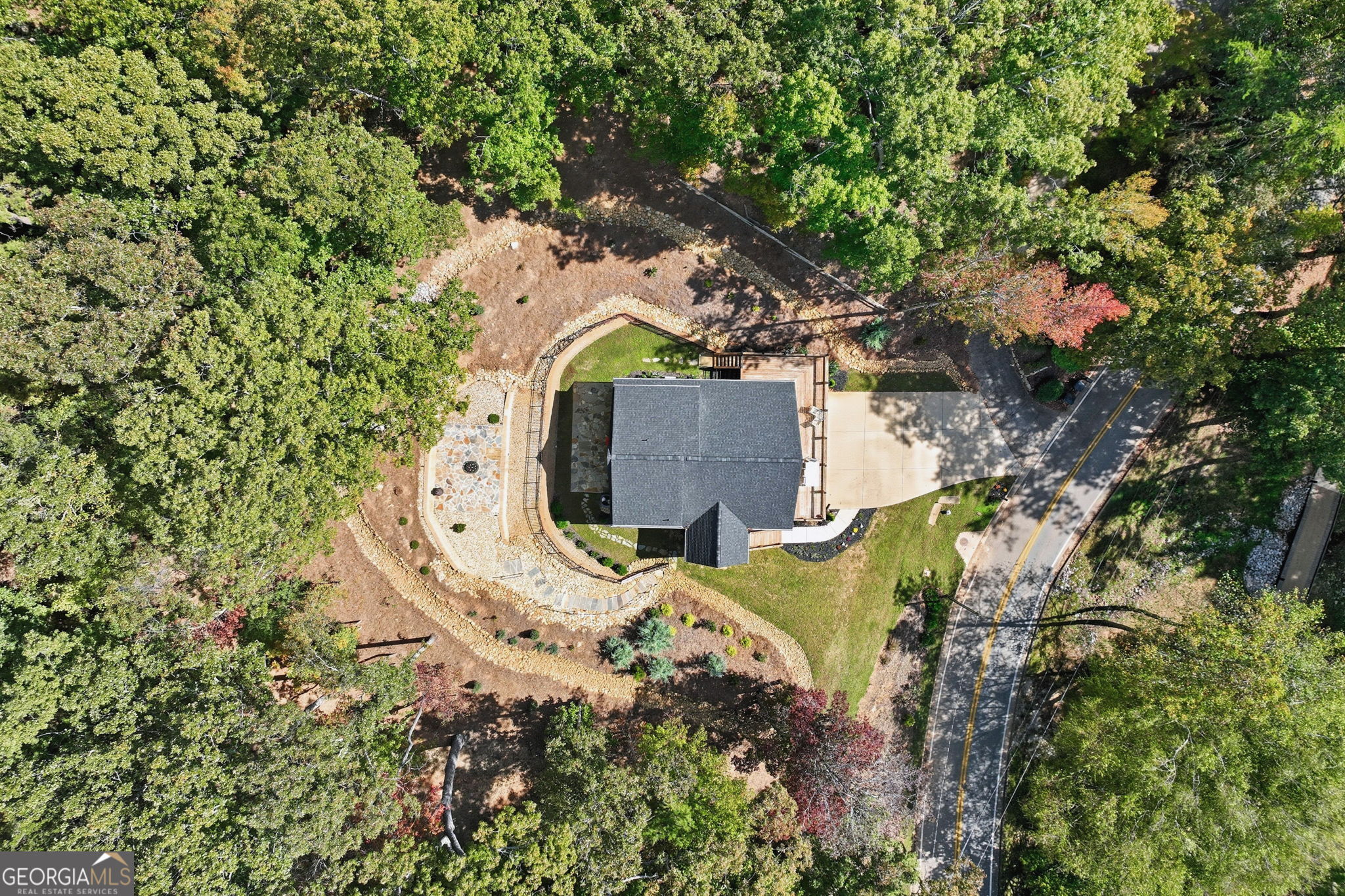 804 Wilshire Road Gainesville, GA 30501 - Photo 31 of 41 an aerial view of a house with a yard and large trees