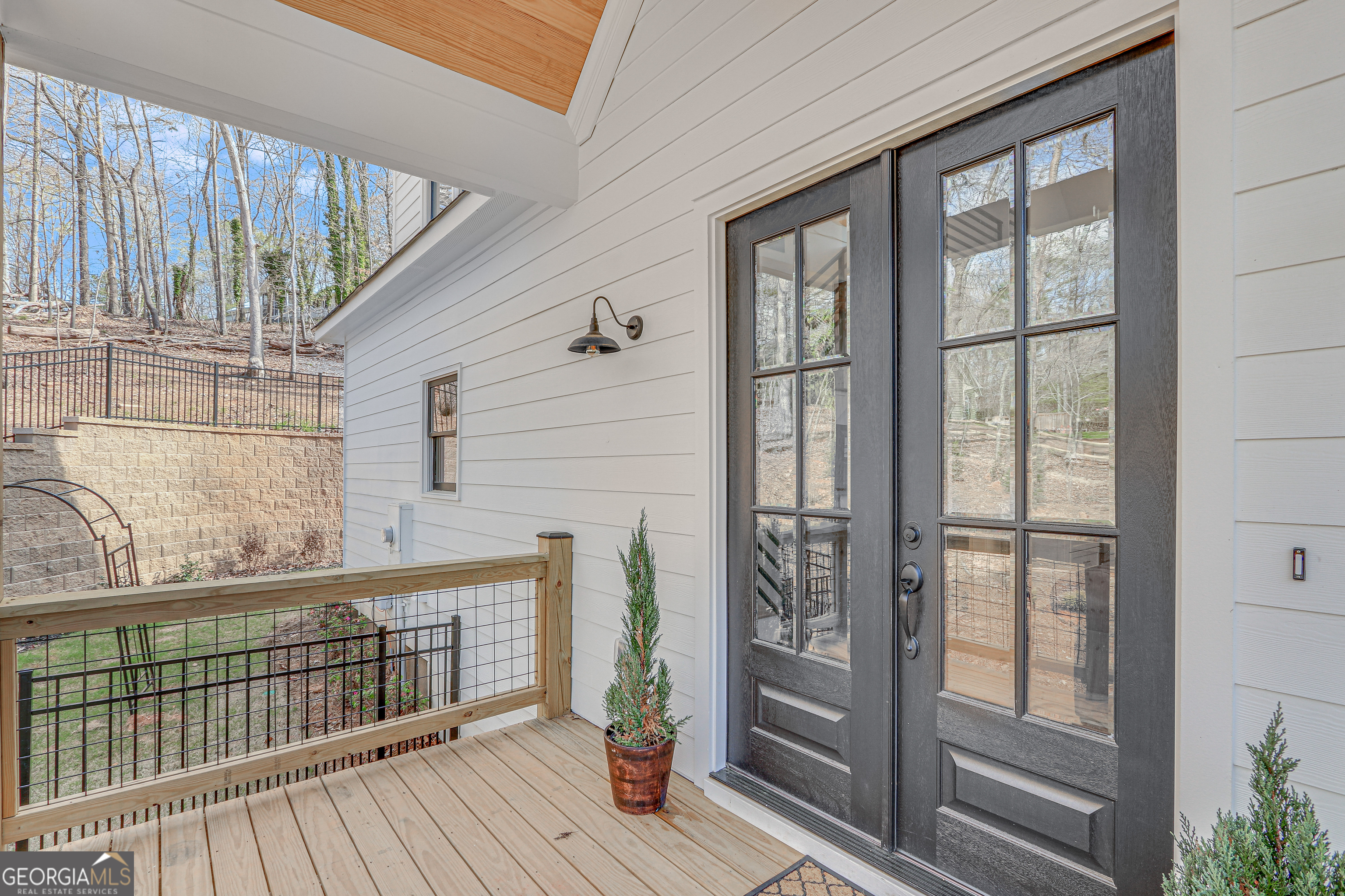 804 Wilshire Road Gainesville, GA 30501 - Photo 4 of 41 a view of a balcony with wooden floor
