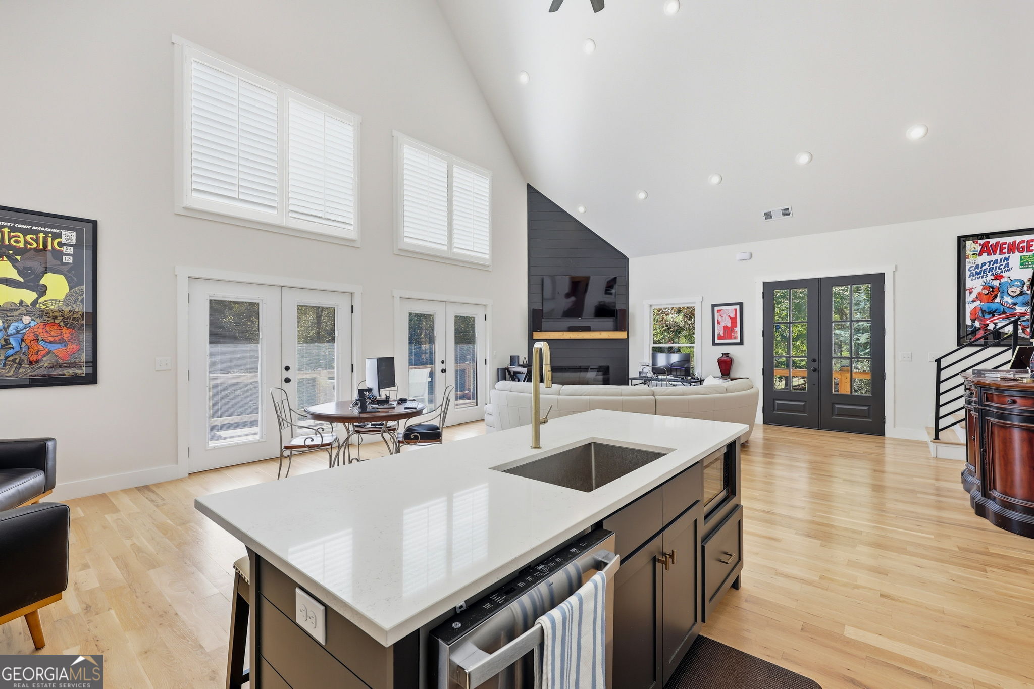 804 Wilshire Road Gainesville, GA 30501 - Photo 7 of 41 a kitchen with stainless steel appliances granite countertop a sink a stove and a refrigerator