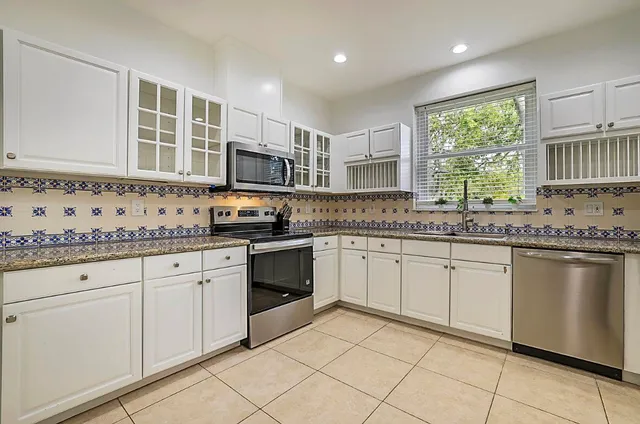 a view of a house with a big yard