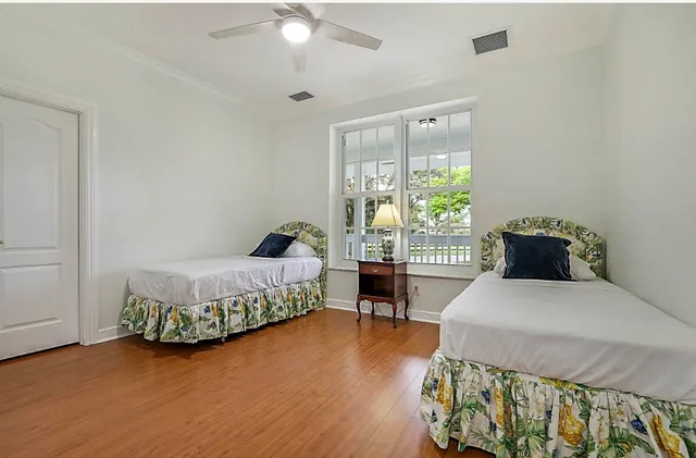 a kitchen with a stove top oven and cabinets