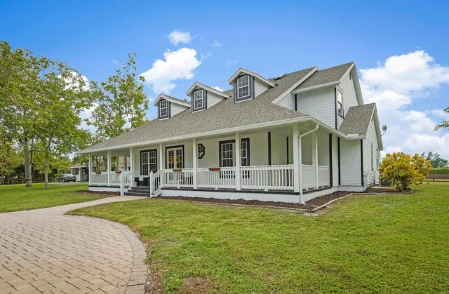 a view of a lake with a big yard