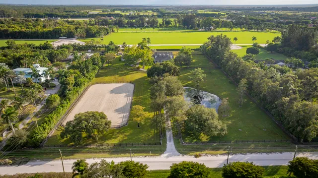 a view of staircase with white walls and windows