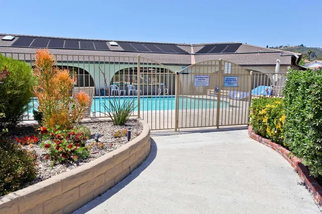 a view of a backyard with a fountain