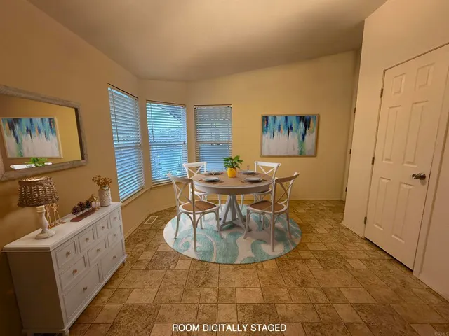a dining room with furniture