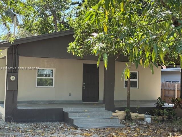 328 Northeast 57th Street Miami, FL 33137 - Photo 16 of 16 a front view of a house with garden