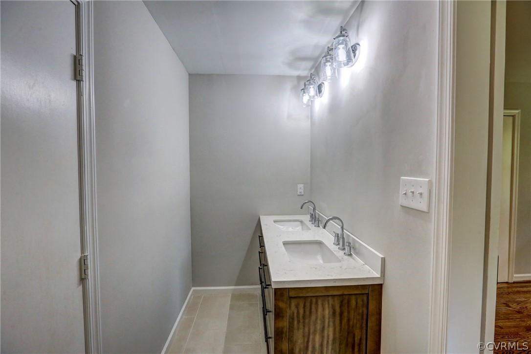 1820 Hawk Town Road Maidens, VA 23102 - Photo 34 of 46 a bathroom with a sink and a mirror