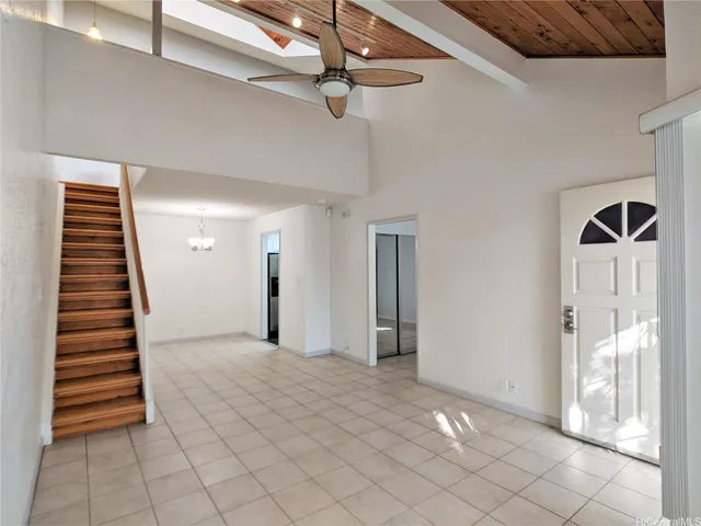 a view of a hallway view with staircase