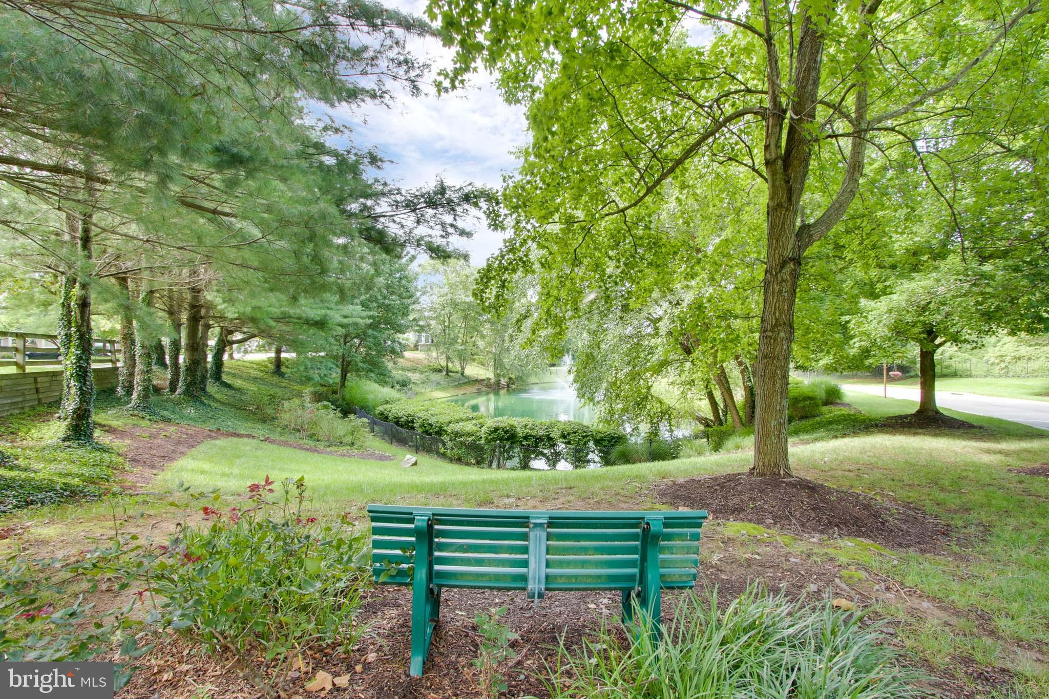 8818 Howard Forest Lane Baltimore, MD 21208 - Photo 31 of 31 a view of a bench in a garden