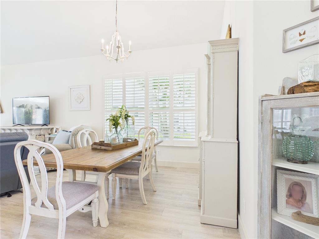 426 Long Cove Road Ormond Beach, FL 32174 - Photo 17 of 73 a view of a dining room with furniture window and outside view