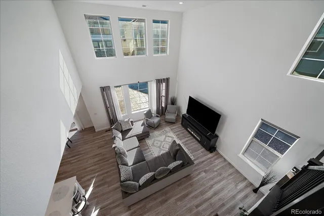 a view of living room with furniture and flat screen tv