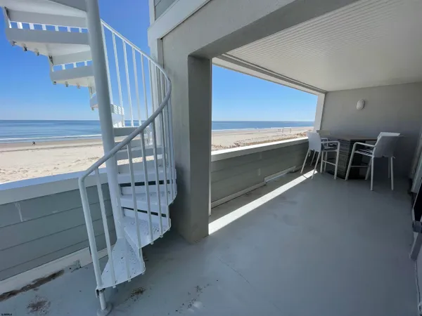 a view of a balcony with city view