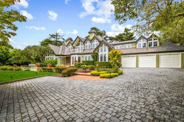 a view of a house with a swimming pool