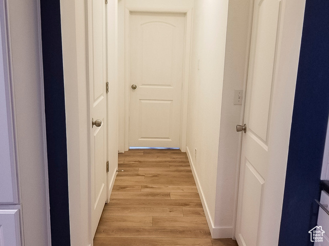 2855 South 1000 West Perry, UT 84302 - Photo 53 of 142 Corridor with baseboards and light wood-type flooring