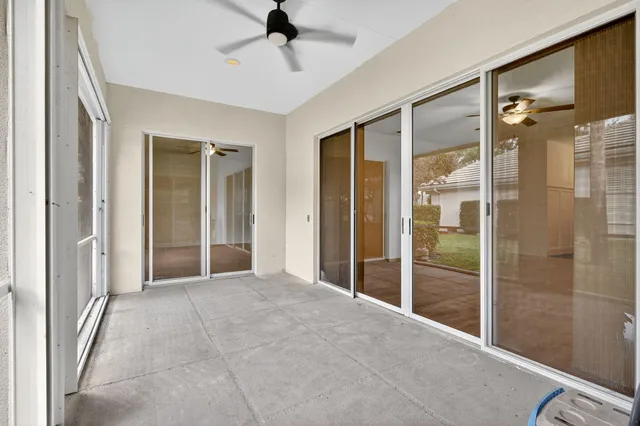 a view of a hallway with a chandelier