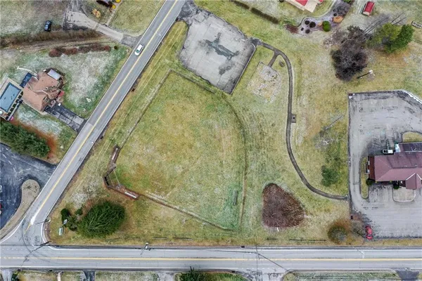 an aerial view of residential house with outdoor space