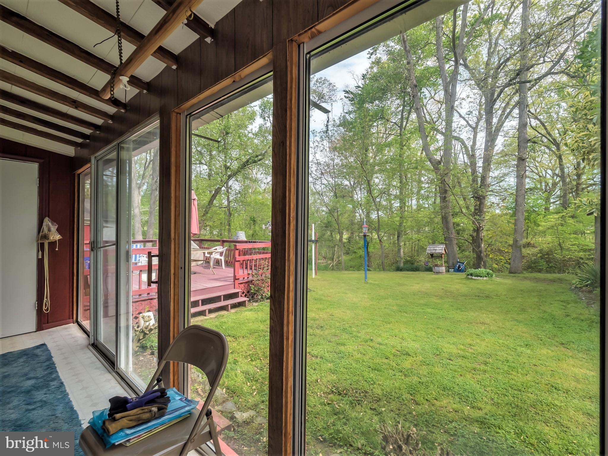 37 Robshire Manor Road Huntingtown, MD 20639 - Photo 14 of 36 Sunroom has a nice view and no mosquitos