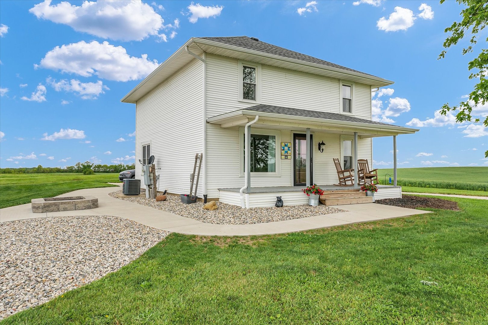 55 North 2600E Road Rankin, IL 60960 - Photo 1 of 48 a view of a house with backyard and sitting area
