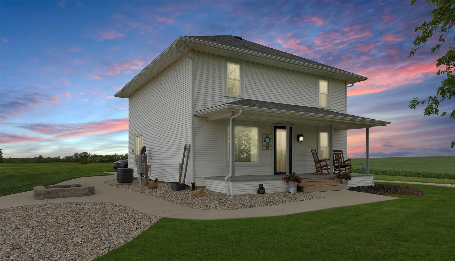 55 North 2600E Road Rankin, IL 60960 - Photo 2 of 48 a front view of a house with garden