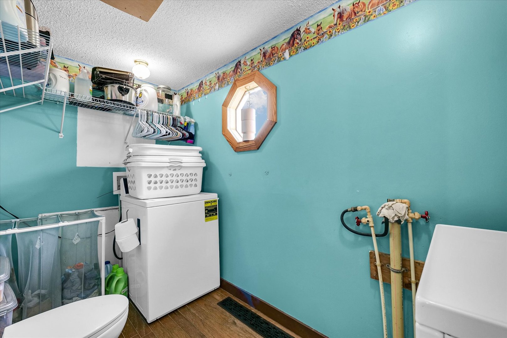 55 North 2600E Road Rankin, IL 60960 - Photo 24 of 48 a bathroom with a toilet mirror and vanity