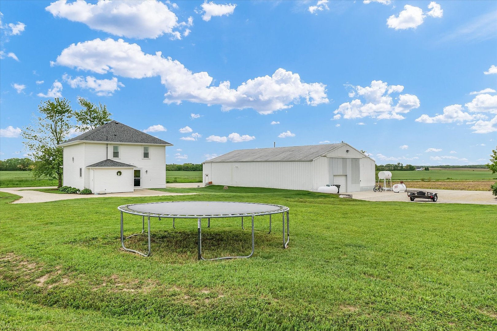 55 North 2600E Road Rankin, IL 60960 - Photo 36 of 48 a front view of a house with garden