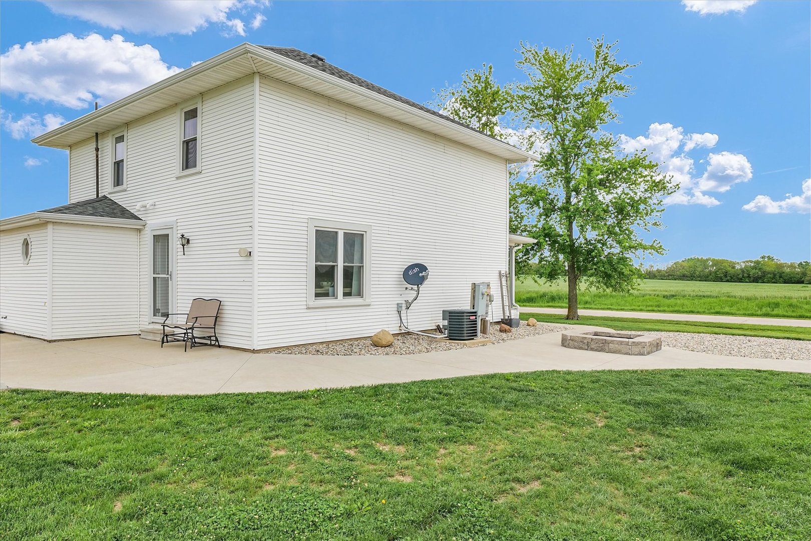 55 North 2600E Road Rankin, IL 60960 - Photo 37 of 48 a backyard of a house with seating space