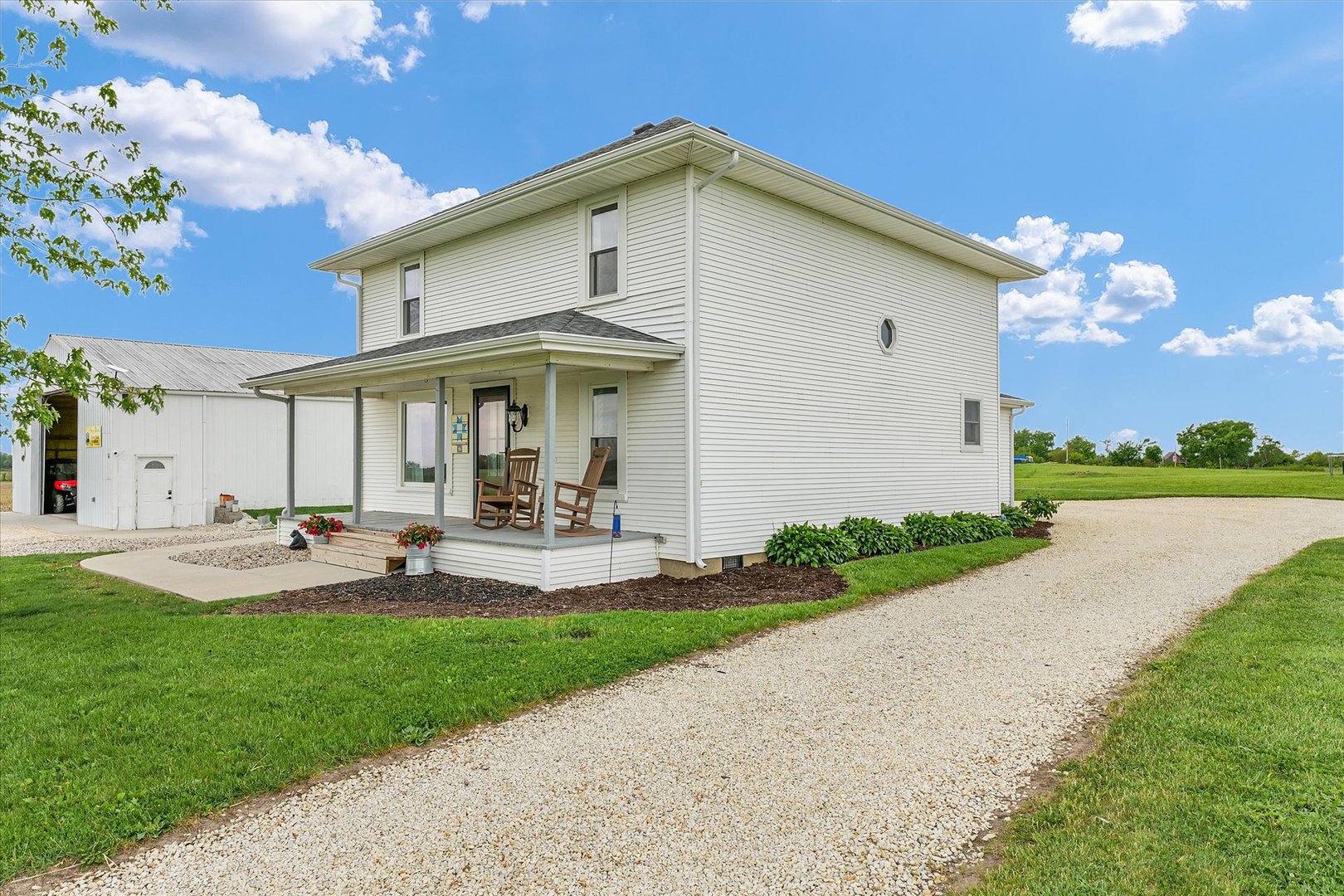 55 North 2600E Road Rankin, IL 60960 - Photo 4 of 48 a front view of a house with swimming pool having outdoor seating