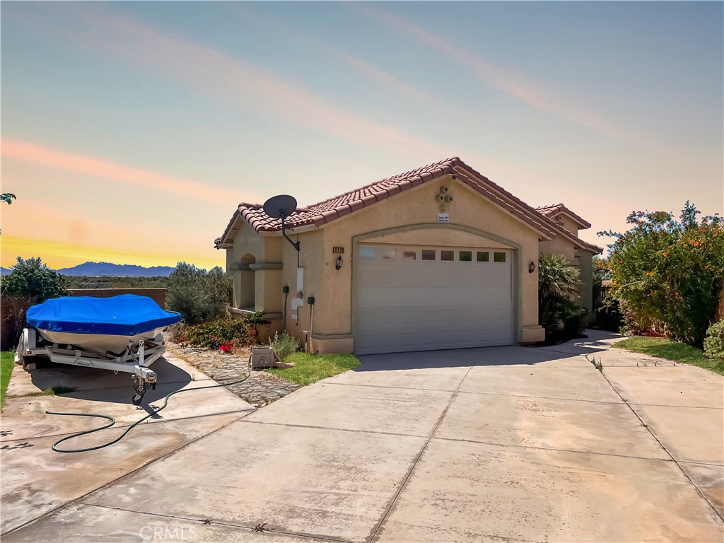 a front view of a house with a garage