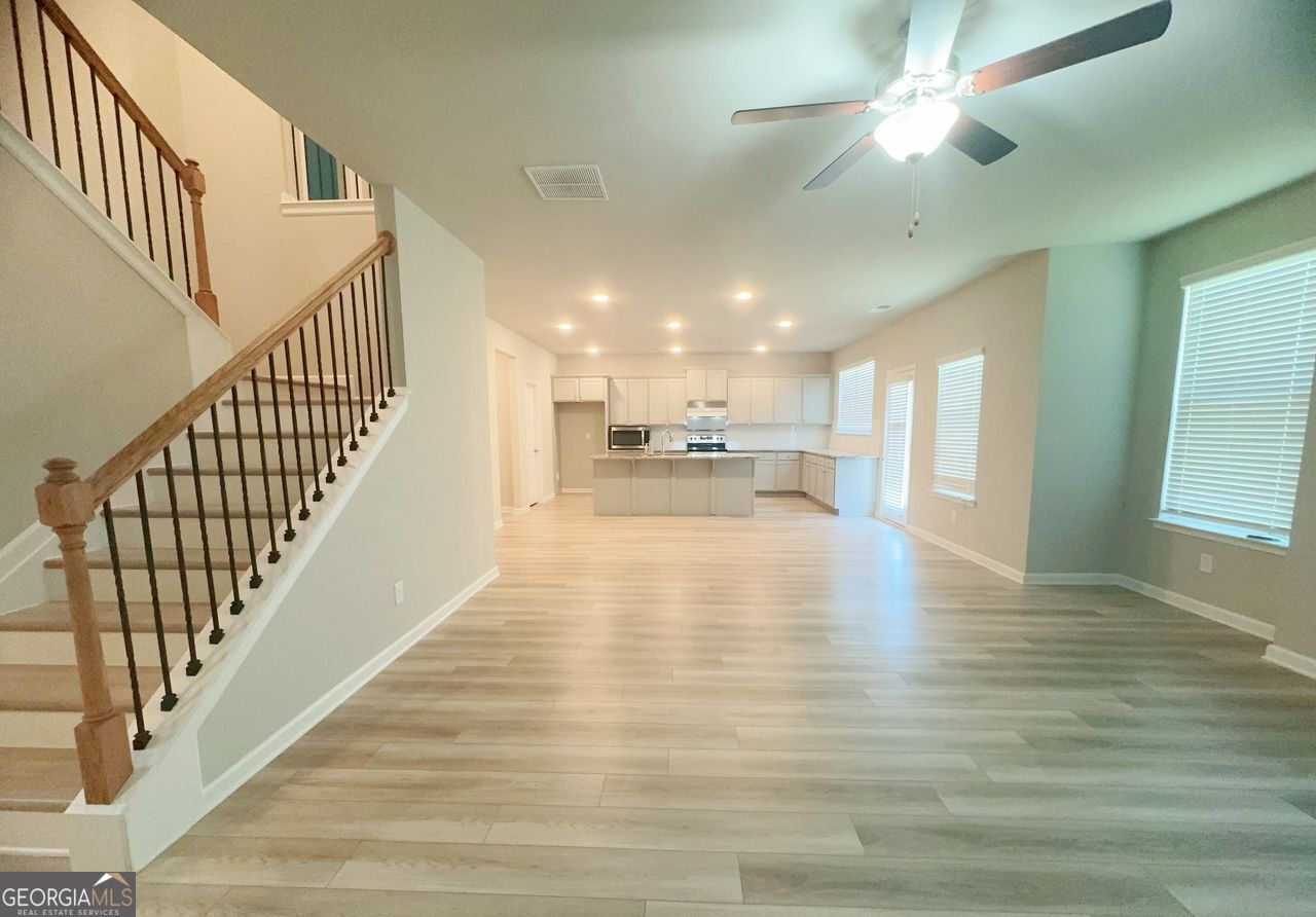 446 Sawmill Trace Hampton, GA 30228 - Photo 5 of 15 a view of an entryway and kitchen view