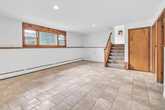 an empty room with windows